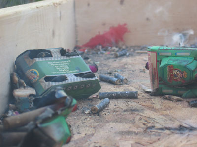 I love that the red smoke-bomb made that smear on the wall in the background!